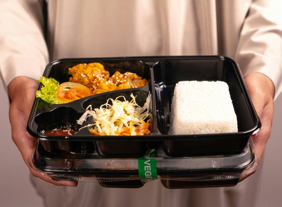 Nutritional comparison chart: falafel wrap box vs. typical fast-casual lunch bowl showing higher fiber, lower sodium, and comparable protein